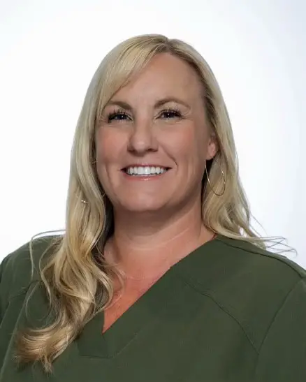Smiling woman with long blonde hair